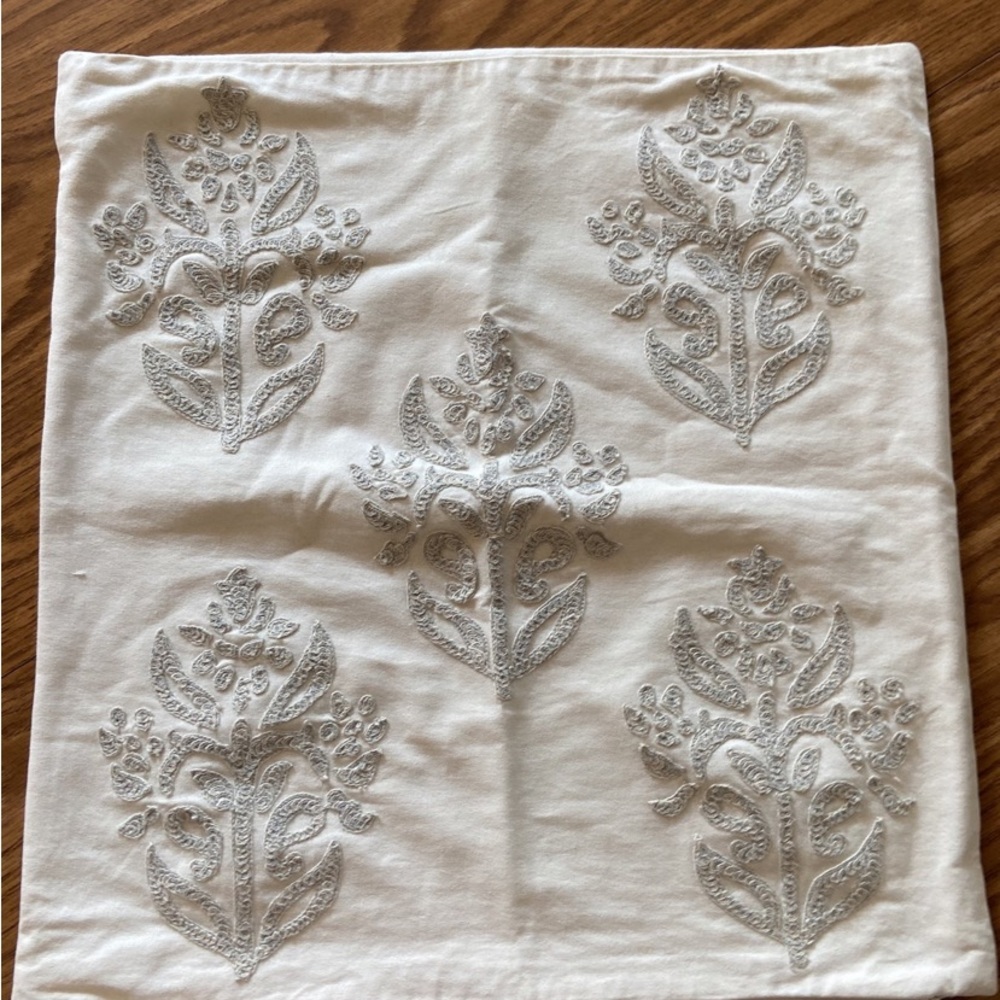 Pottery Barn cream with gray embroidery 18X18 in.